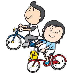 自転車に乗る夫婦